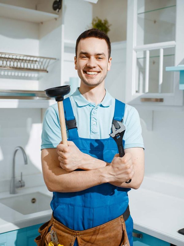 cheerful-male-plumber-holds-wrench-and-plunger-resize.jpg cheerful-male-plumber-holds-wrench-and-plunger-resize.jpg